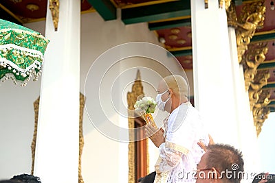 Bangkok, Thailand - Mar 20, 2020: Thai males are ordained at the age of 21 years up to replace the grateful parents Editorial Stock Photo