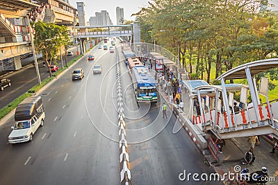 Bangkok, Thailand - March 8, 2017: Crowd of passengers are queuing for bus at Phahon Yothin Road, interchange of Mochit BTS sky t Editorial Stock Photo