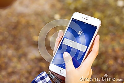 BANGKOK ,THAILAND - March 05, 2017 : Login Screen Facebook icons on Apple iPhone. largest and most popular social networking site Editorial Stock Photo