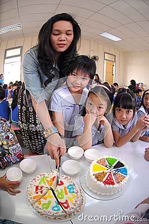 Primary school students organize birthday parties in the school canteen. Editorial Stock Photo