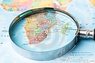 Bangkok, Thailand - May 01, 2022 Africa, Magnifying glass close up with colorful world map Editorial Stock Photo