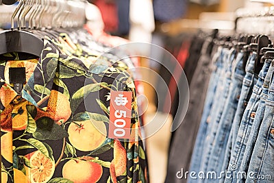 Shopping in Bangkok, Thailand: a shirt with a price tag in Thai bahts Editorial Stock Photo