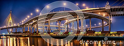 BANGKOK, THAILAND - MAY 22: Industrial Ring Road Samut Prakan Junction fully operational and lights up during twilight hours in Editorial Stock Photo