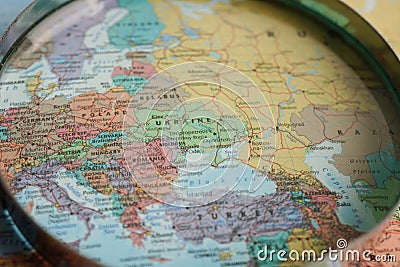 Bangkok, Thailand - May 15, 2022 Magnifying glass on world map Editorial Stock Photo