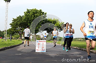 Bangkok Thailand - May 21, 2017 - Singha Logo on Marathon runners Group People Race Outdoor Sport Training Editorial Stock Photo