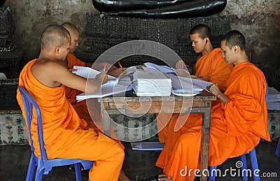 Bangkok, Thailand: Monks at Wat Suthat Editorial Stock Photo