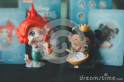 Bangkok, Thailand - November 11, 2023: POP MART Disney 100th anniversary Princess Childhood Series, Ariel and Tiana Editorial Stock Photo