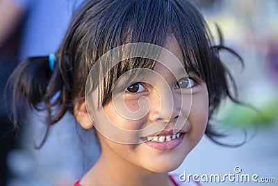 Positive portrait of a thai young girl on the streets of Bangkok, Thailand Editorial Stock Photo