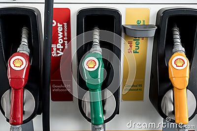 BANGKOK, THAILAND - November 30, 2023 : Close up fuel nozzles at Shell gas station, Panel and Dashboard of fuel nozzles of Gasohol Editorial Stock Photo