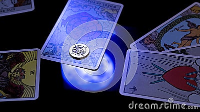 Bangkok,Thailand,november.13.19: Tarot cartomancy. Cards for divination on a black background with the reflection of the moon. Editorial Stock Photo