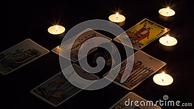 Bangkok,Thailand,november.13.19. Tarot cartomancy. Cards for divination on a black background with the reflection of the moon. Stock Photo