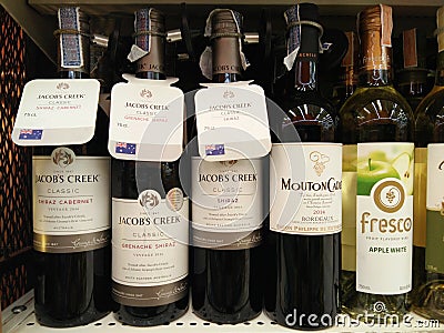 Bottles of wine on shelf at supermarket Editorial Stock Photo