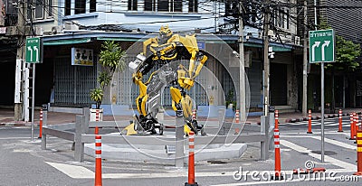 Large-scale fictional character at an intersection in Bangkok Editorial Stock Photo