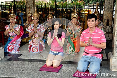 Bangkok, Thailand: People Praying at Erawan Shrine Editorial Stock Photo
