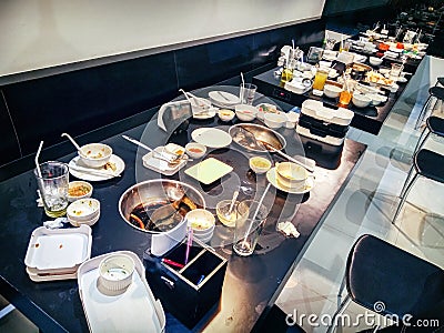 BANGKOK, THAILAND - SEPTEMBER 09: Customers leave dirty tables in Shabu Chain restaurant Bangkhae store after dining in Bangkok on Editorial Stock Photo