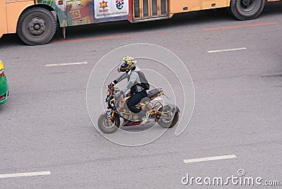 Customized motorbike driving on Phayathai Rd Editorial Stock Photo