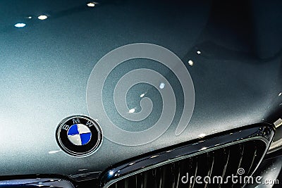 Bangkok, Thailand - September 14, 2019 : Front picture of BMW car, closeup on logo and grill of silver BMW sport car. BMW is Editorial Stock Photo