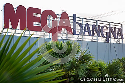 Bangkok, Thailand: a sign board of Megabangna Shopping Mall with palm trees in the foreground. Editorial Stock Photo