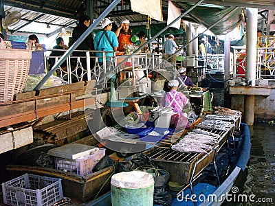 Typical cuisine on a boat at the Taling Chan Floating Market in Bangkok Editorial Stock Photo