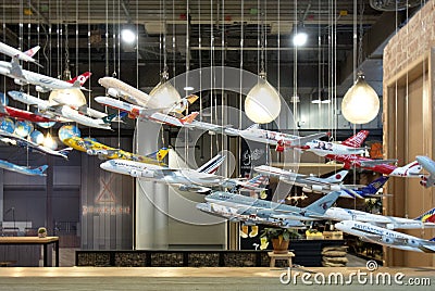 BANGKOK, THAILAND - September 16, 2017 : Variety brand airway of plane model hang for decorate in coffee shop at community mall. Editorial Stock Photo