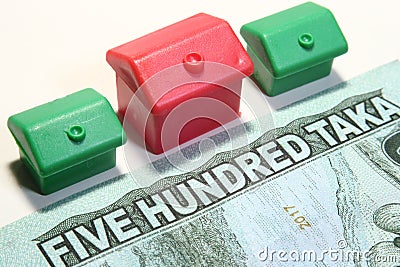 Bangladeshi currency or taka and toy house, Stock Photo