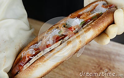 banh mi while preparing, Vietnamese style of sandwich Stock Photo