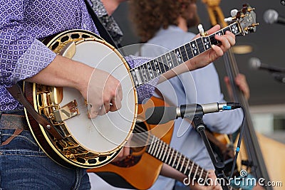 Banjo player in a band Stock Photo