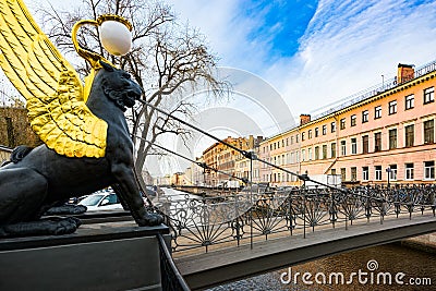 Bank Bridge is decorated with figures of griffins. Urban View of Saint Petersburg. Russia Editorial Stock Photo