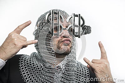 Bank, businessman with medieval executioner in metal and silver Stock Photo