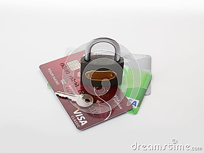 Bank cards and key lock, conceptual idea: protection and storage of money Editorial Stock Photo