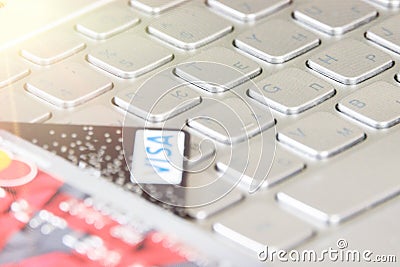 Bank Credit Card on a Computer Keyboard Editorial Stock Photo