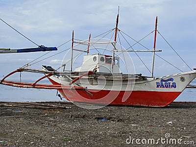 Bangkas, a traditional type of outrigger boats used by Filipino artisanal fishermen Editorial Stock Photo