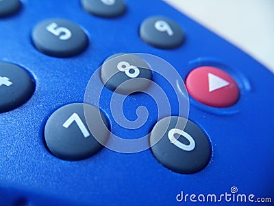 Banking token device in closeup look showing number keys and the red enter button Stock Photo
