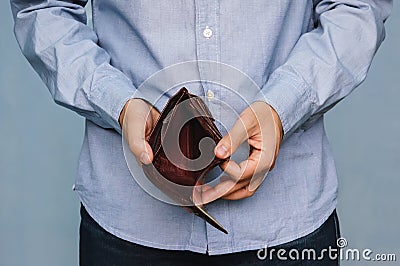 Bankruptcy - Business Person holding an empty wallet Stock Photo