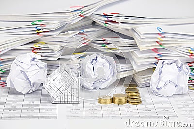 Bankruptcy of house with step pile of tumbledown gold coins Stock Photo