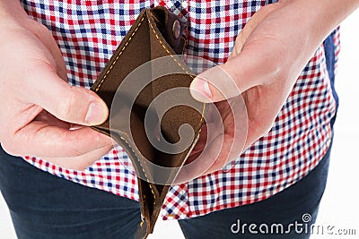 Bankruptcy - Male Person holding an empty wallet, hand holding Empty Wallet Stock Photo