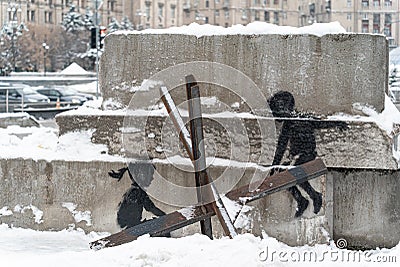 Banksy graffiti in the center of Kyiv, Ukraine Editorial Stock Photo