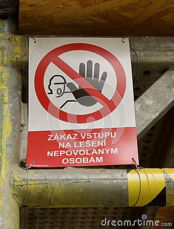 A banned sign in the city, `no entry to scaffolding for unauthorized persons` Stock Photo