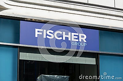 The banner of Fischer Group travel agency at storefront. It operates in Czech Republic and other countries Editorial Stock Photo