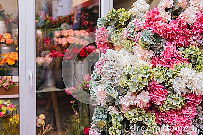 Banner florist shop, closeup luxurious flowers bouquet, in background fridge storage Stock Photo