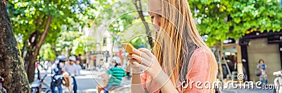 BANNER, LONG FORMAT Woman using phone app for taxi ride hailing service or reading travel guide. Girl tourist searching Stock Photo