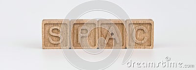 Banner on SPAC Special Purpose Acquisition Company theme. wooden cubes with the word `SPAC`, on white background Stock Photo