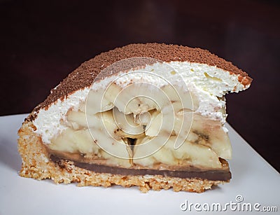 Banoffee pie on wooden plate Stock Photo