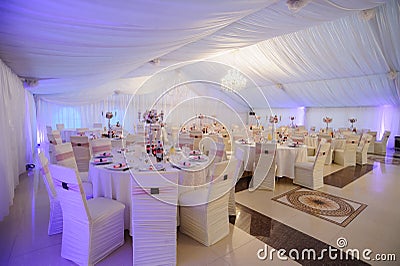 The banquet hall with round tables Stock Photo