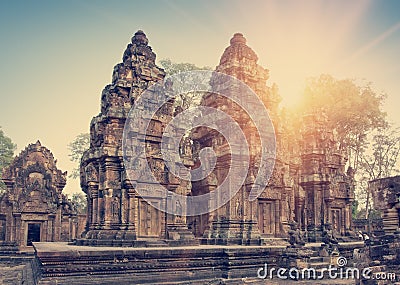 Banteay Srey Temple ruins Xth Century on a sunset, Siem Reap, Cambodia. Toning Stock Photo