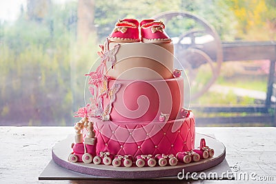 Baptism daughter baby girl communion party pink cake event Stock Photo
