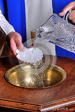 Baptismal Font with water Stock Photo