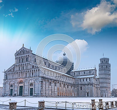 Baptistery of Pisa after a winter snowfall at sunset. Square of Stock Photo