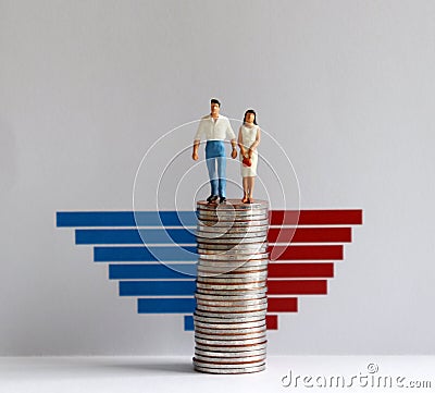 Bar graph and miniature people. Stock Photo