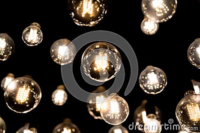Bar Lights hanging on invisible tethers Stock Photo